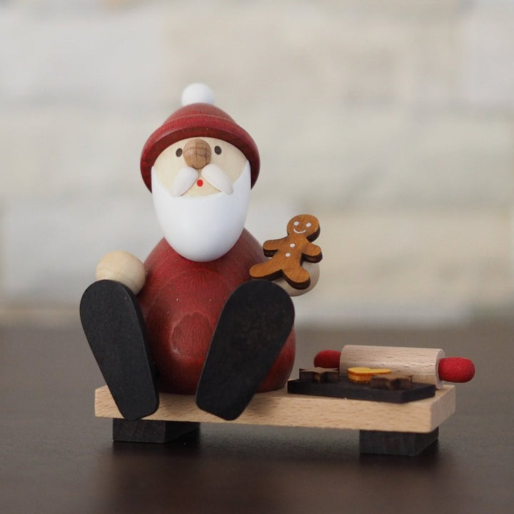 Weihnachtsmann Collectibles - Santa Eating Gingerbread